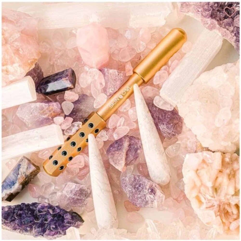 SKIN OWL New in Box with Bag - Rose colored The Glow stick - germanium stones